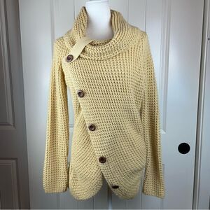 Asymmetrical button up Cowell neck cableknit sweater